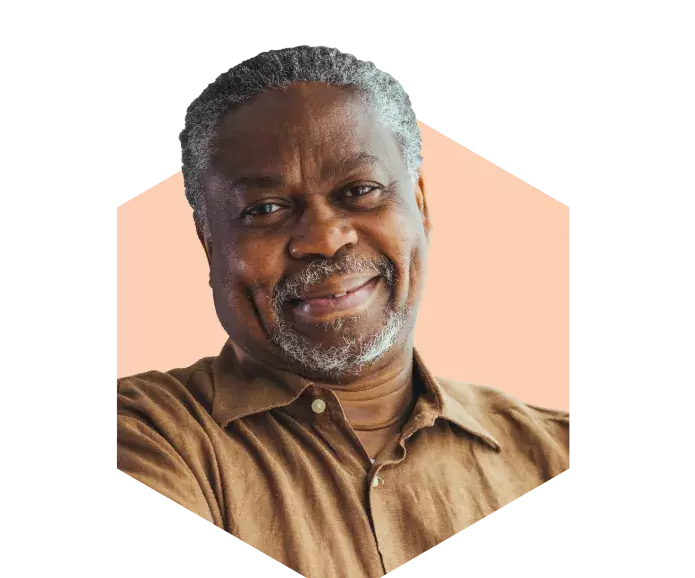 An older black man smiling