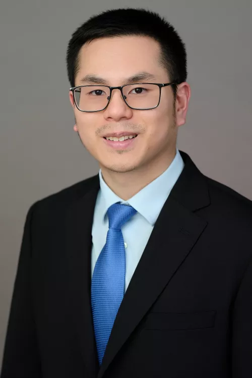 Headshot of Dr. Api Chewcharat