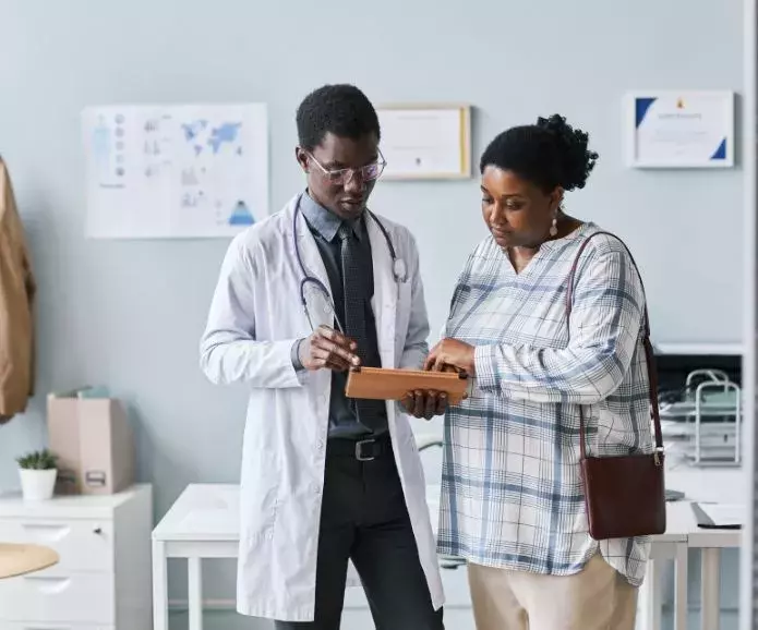 Black doctor and patient