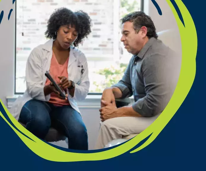 Man reviewing test results with doctor