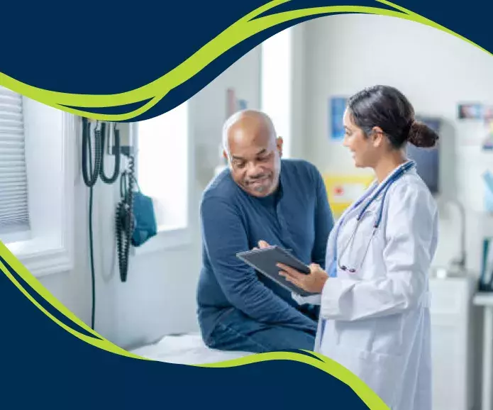 Doctor reviewing clipboard with patient