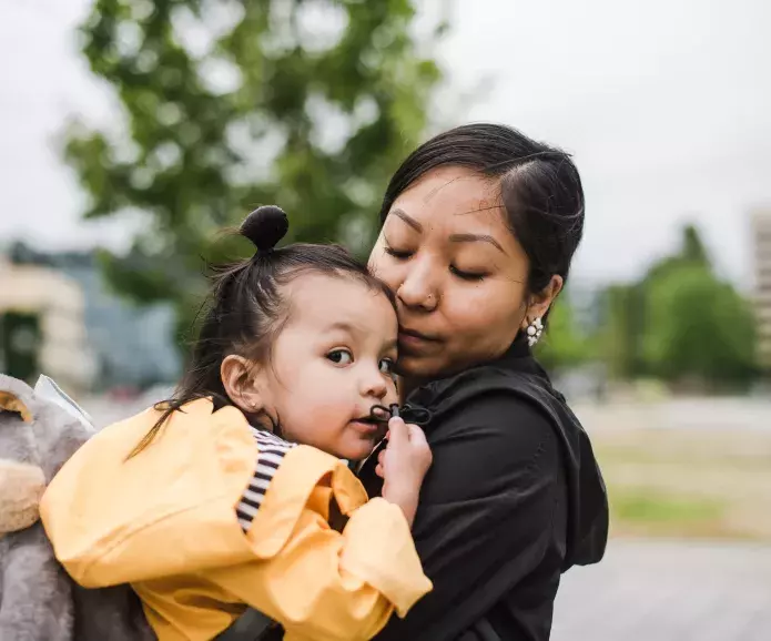 asian mom cuddling toddler park TONL 11266 asian mom cuddling toddler park TONL 11266