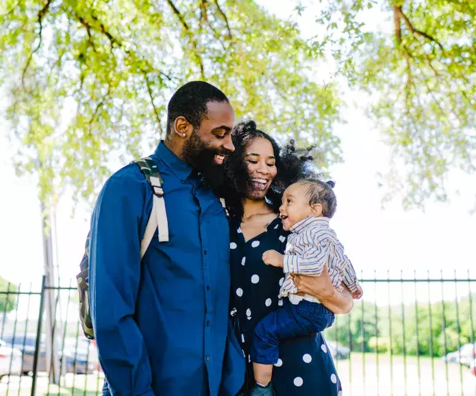 black couple smiling with baby TONL 11097