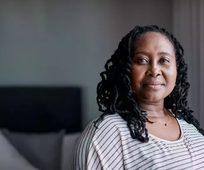 Black woman closeup looking at camera