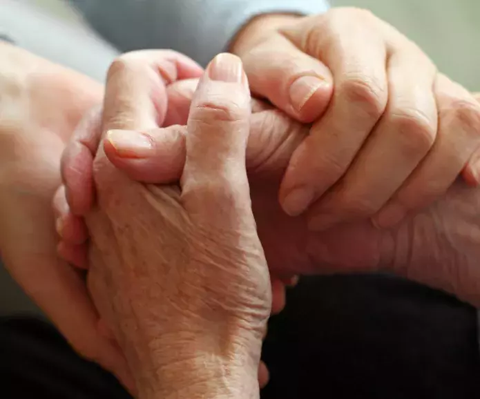 elderly hands holding eachother elderly hands holding eachother
