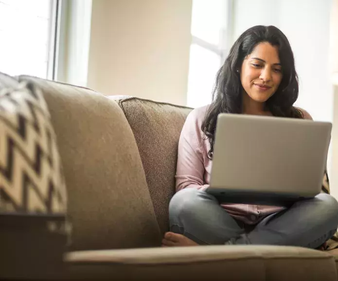 Hispanic lady using a laptop