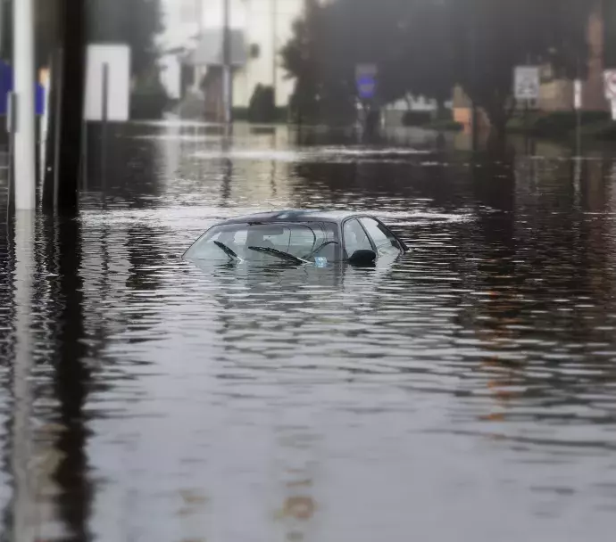 Car stuck in water due to flooding