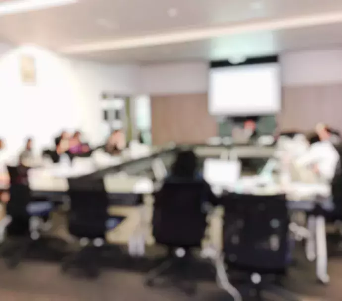 Meeting in an office conference room