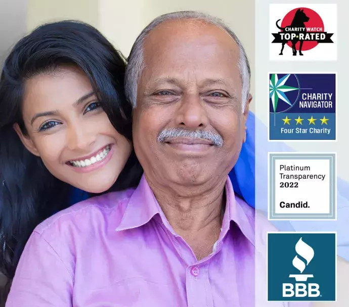 Father and daughter smiling