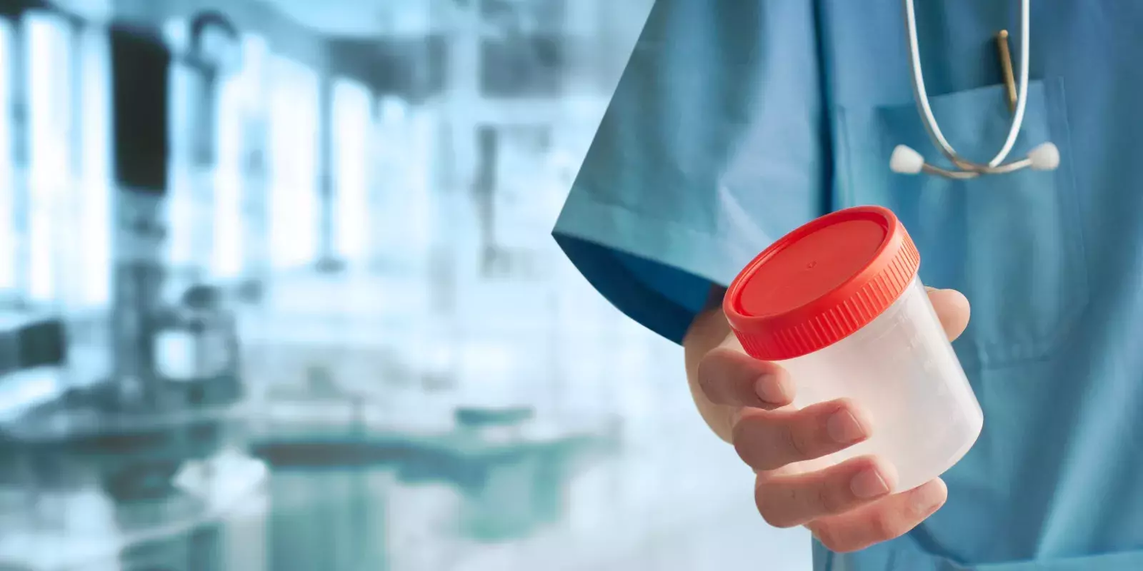 urine test nurse holding cup shutterstock 292061996 1