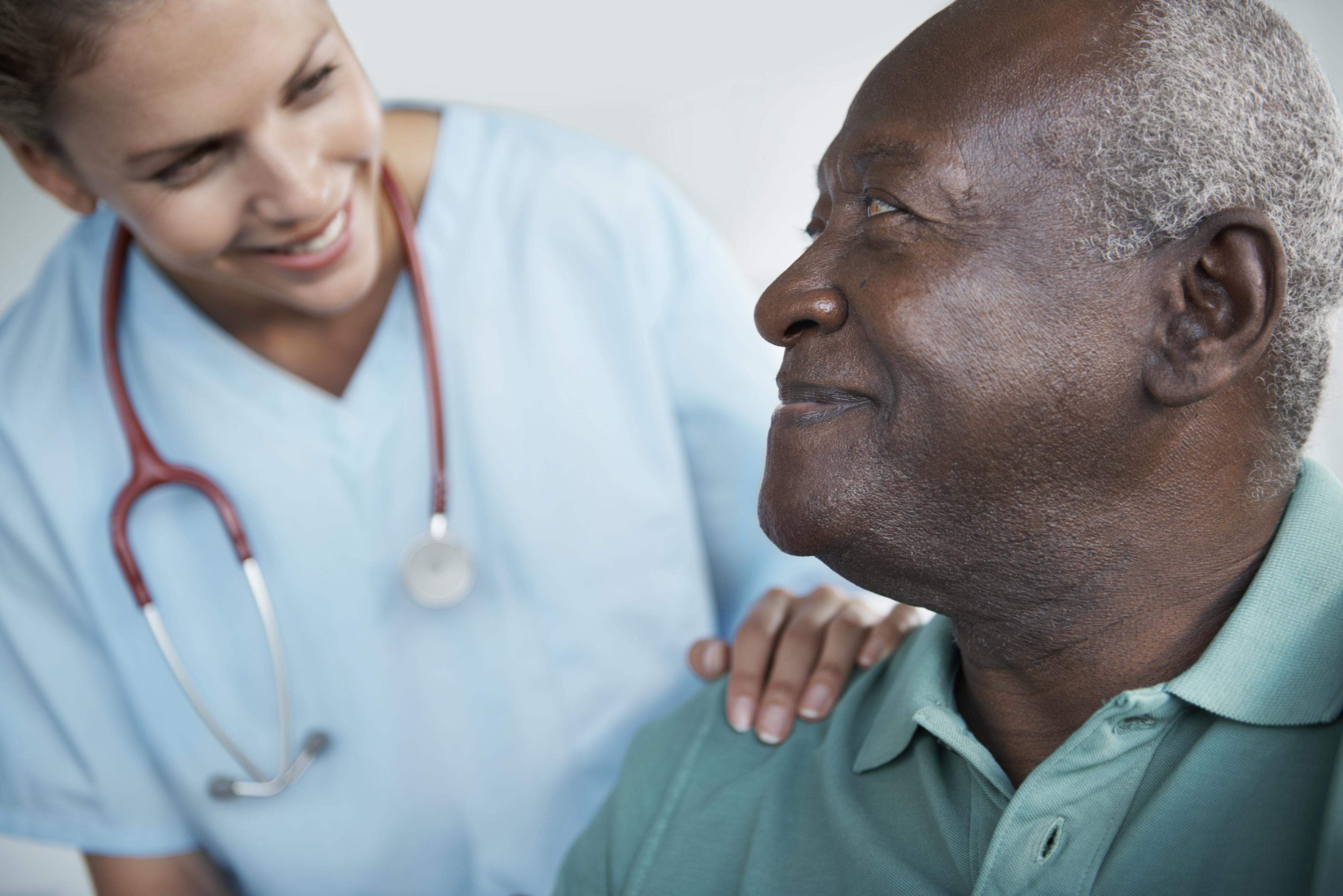 black male patient comforted