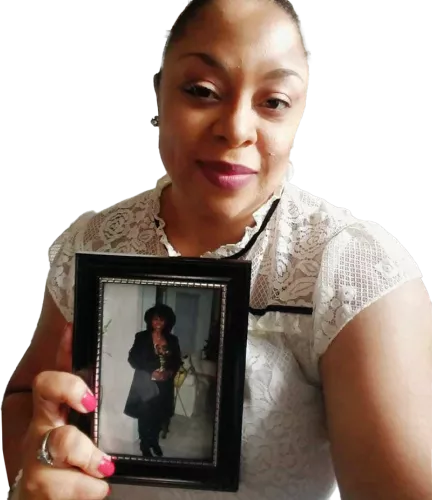 woman holding framed picture